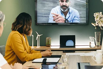 Featured image for the ideas-to-Action Strategy Execution Accelerator, the AI-assisted Virtual Coach platform, showing leader in a video meeting planning organization-wide change initiative
